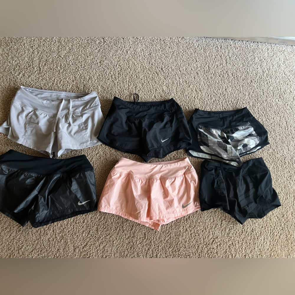 Lot of 8 pairs Nike Dri Fit shorts. I also threw in 3 Nike Dri fit tank tops XS